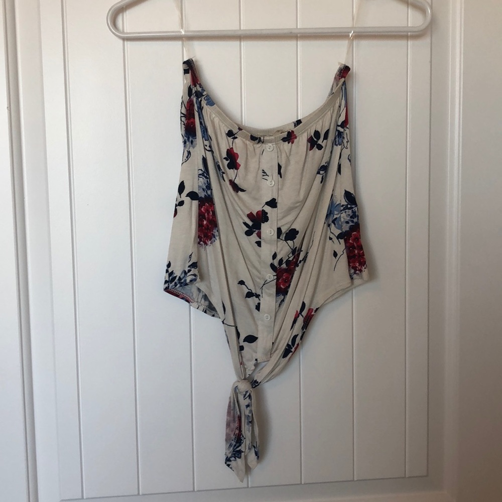 Cream and flowery strapless top